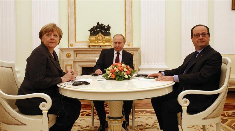 Oland, Merkelova i Putin o Ukrajni i Siriji